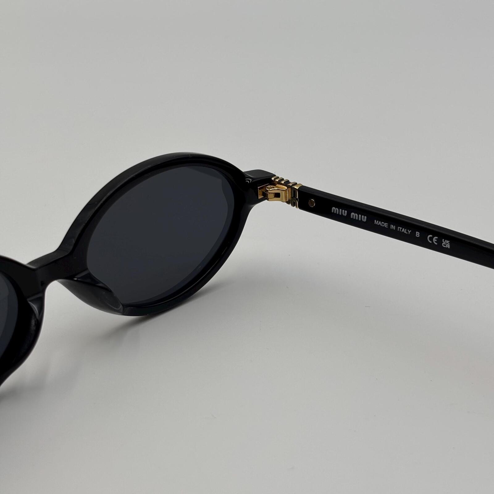 Miu Miu SMU04Z Black Oval Sunglasses