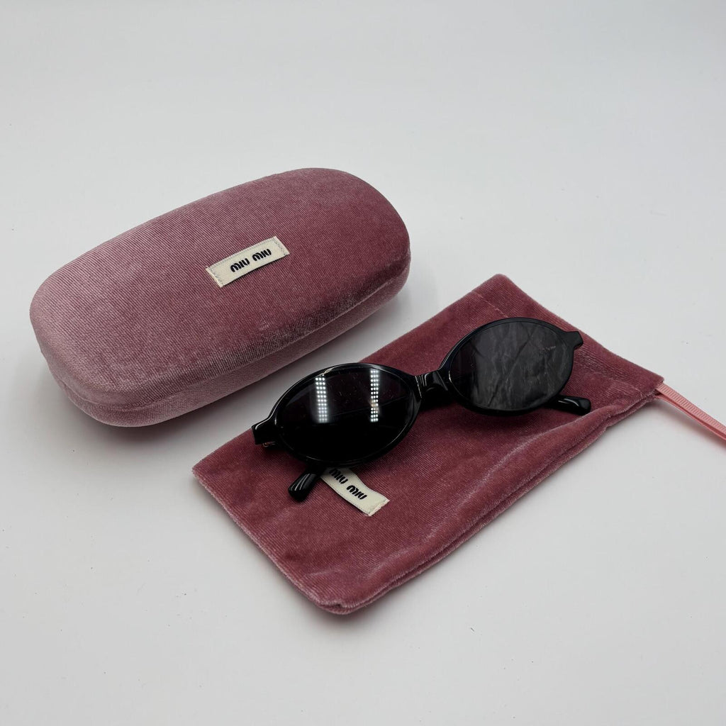 Miu Miu SMU04Z Black Oval Sunglasses
