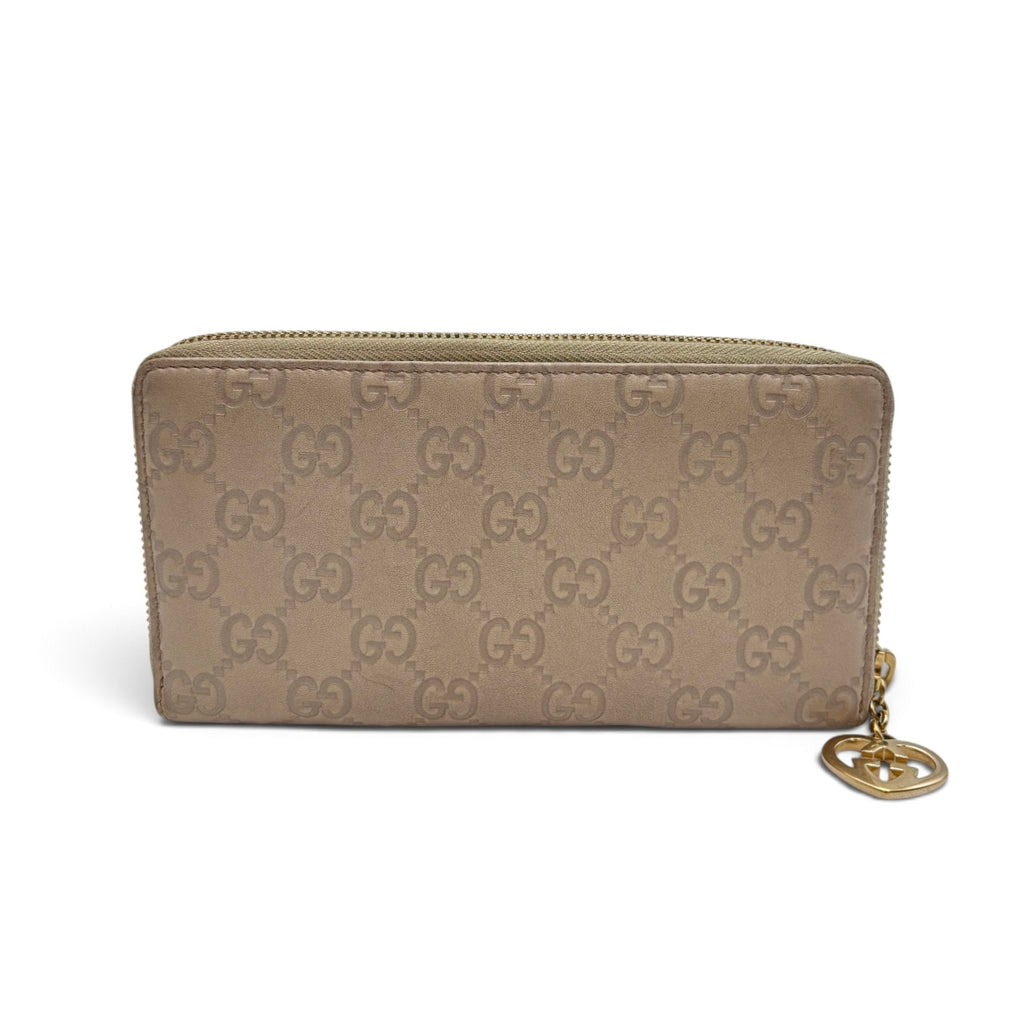 Gucci Guccissima Beige Leather Zip Around Wallet with Gold GG Heart Charm