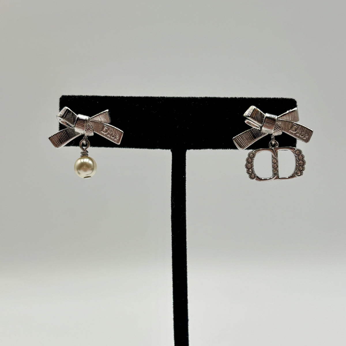 Dior CD Parure Asymmetric Bow Earrings in Silver