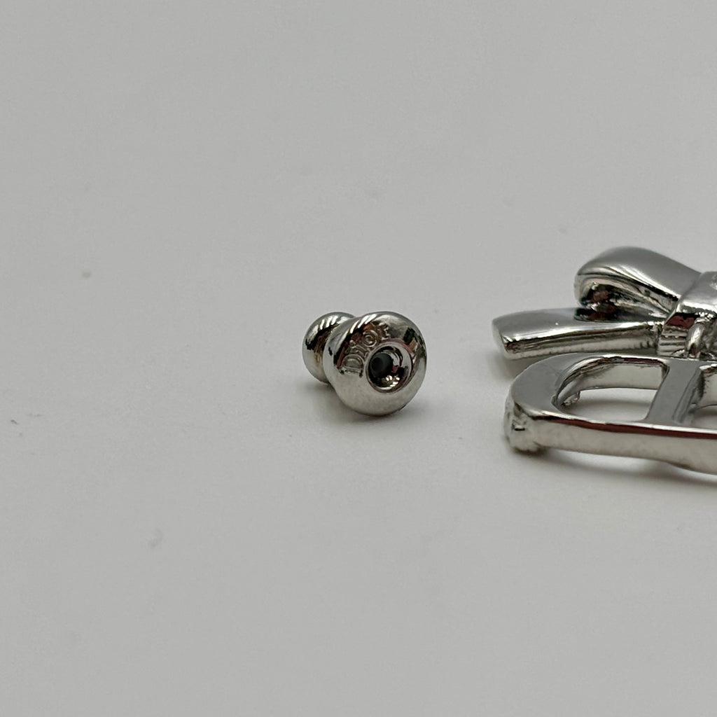 Dior CD Parure Asymmetric Bow Earrings in Silver