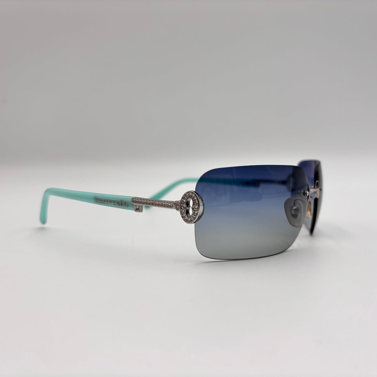 Tiffany & Co. Crystal Key Rimless Blue Gradient Sunglasses