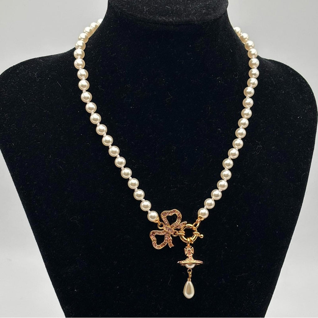 Elegant Pearl Necklace with Gold Accents