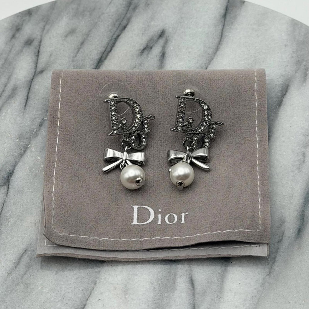 CHRISTIAN DIOR LOGO PEARL BOW DROP EARRINGS SILVER TONE