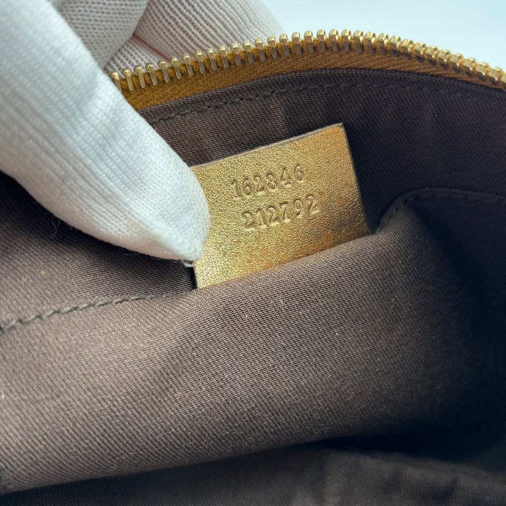 Gucci GG Canvas Bow Wristlet Pouch Metallic Gold Leather