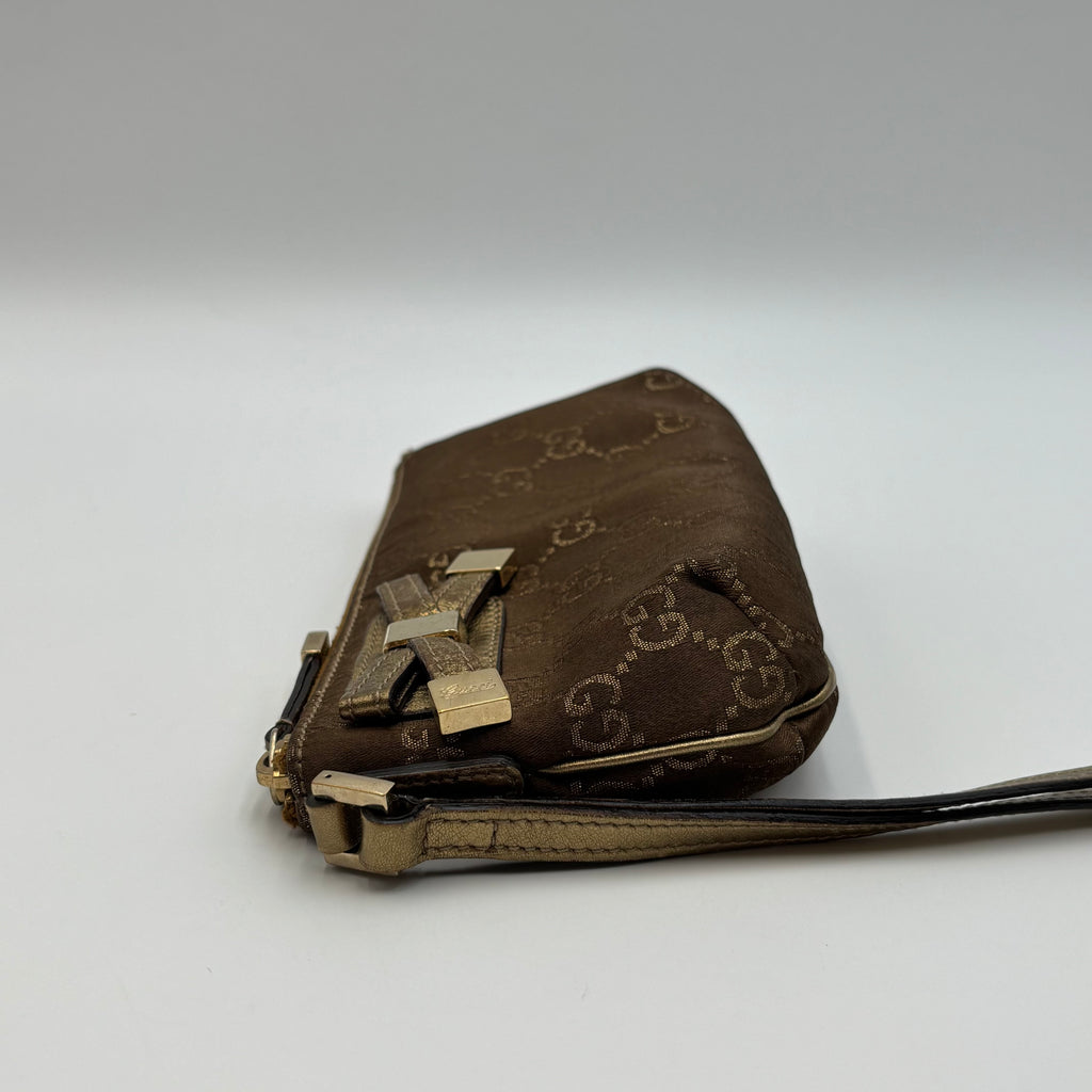 Gucci GG Canvas Bow Wristlet Pouch Metallic Gold Leather