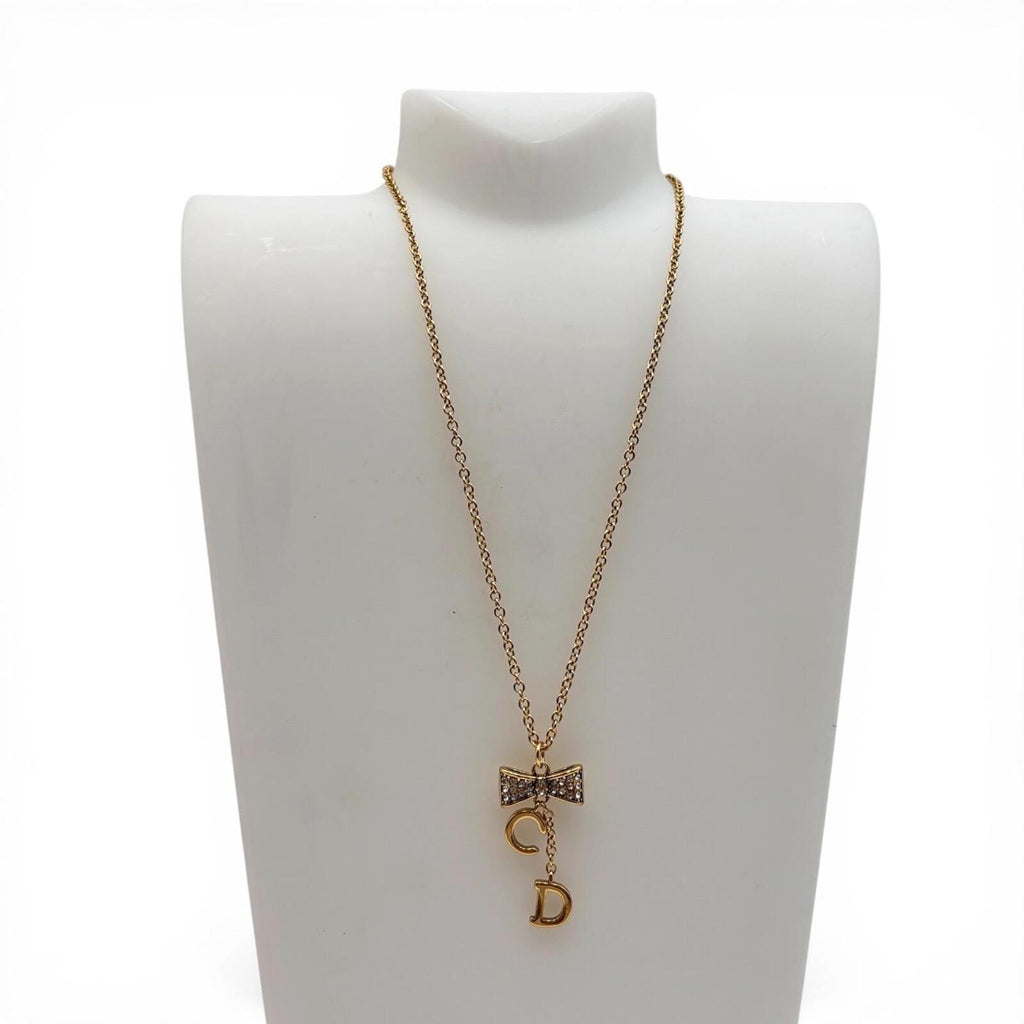Christian Dior Gold Tone CD Bow Pendant Necklace