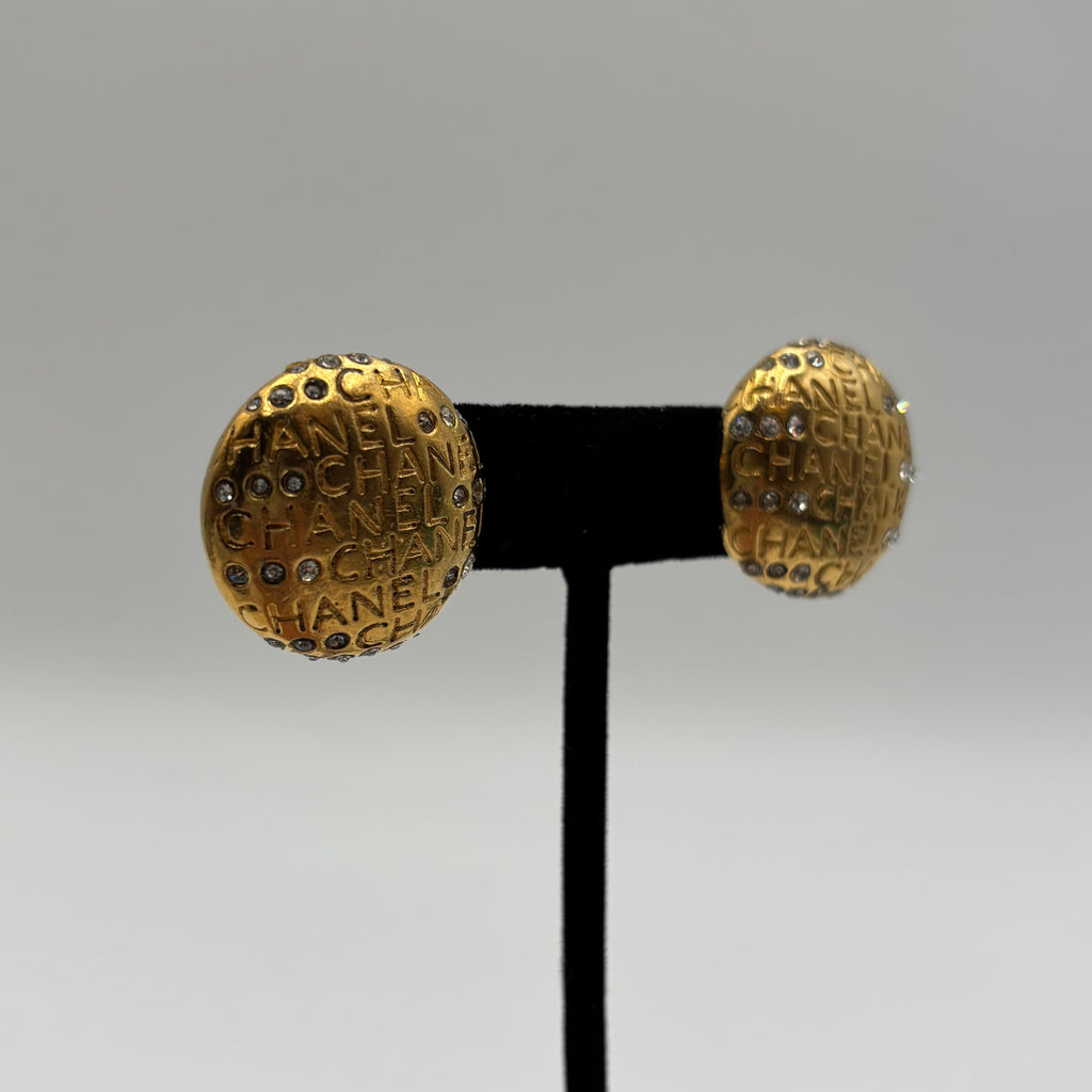 Chanel Gold-Tone Logo Mania Rhinestone Round Clip-On Earrings