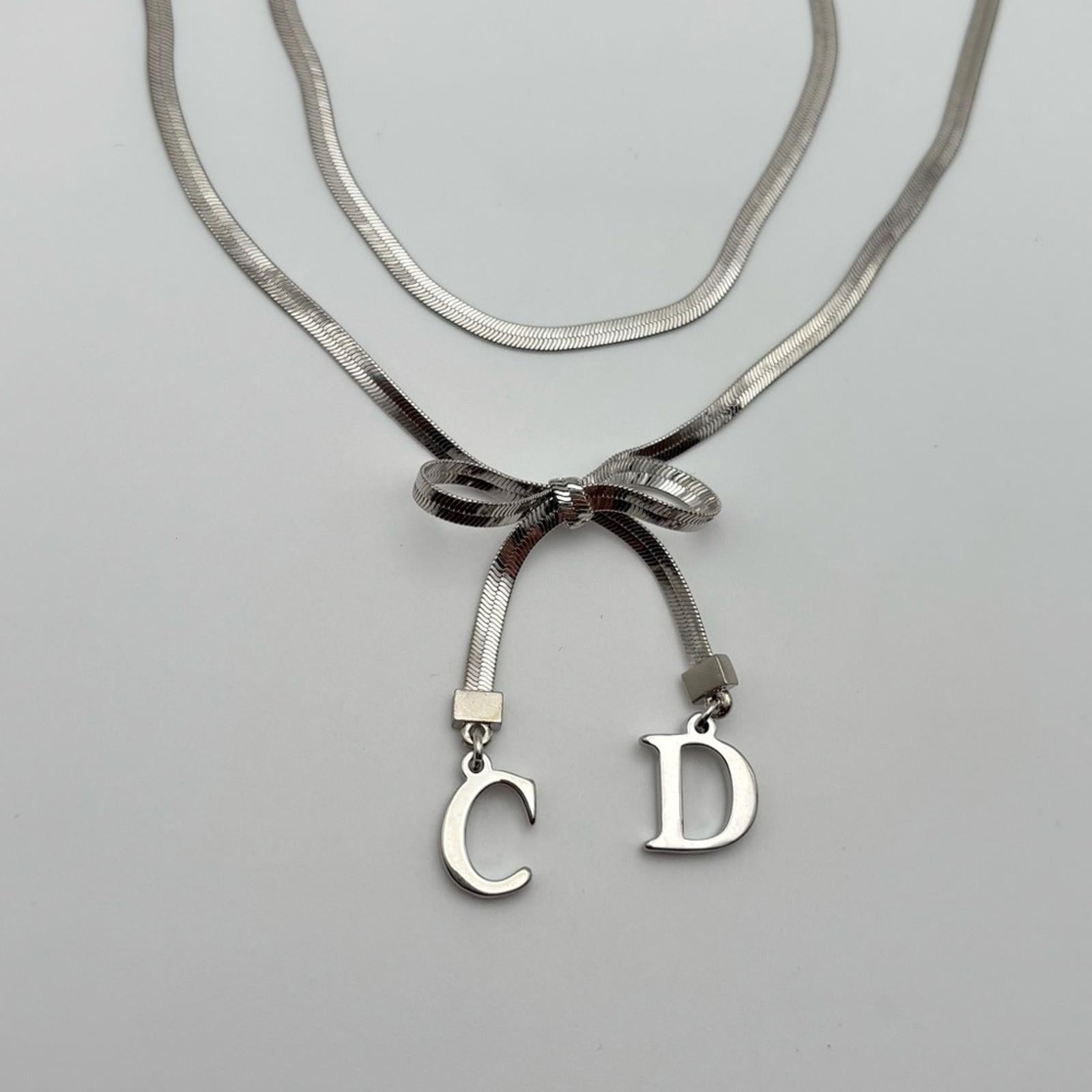 Christian Dior Silver Bow CD Charm Necklace