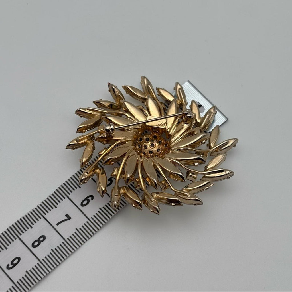 Sherman Aurora Borealis Rhinestone Floral Brooch – Gold Tone