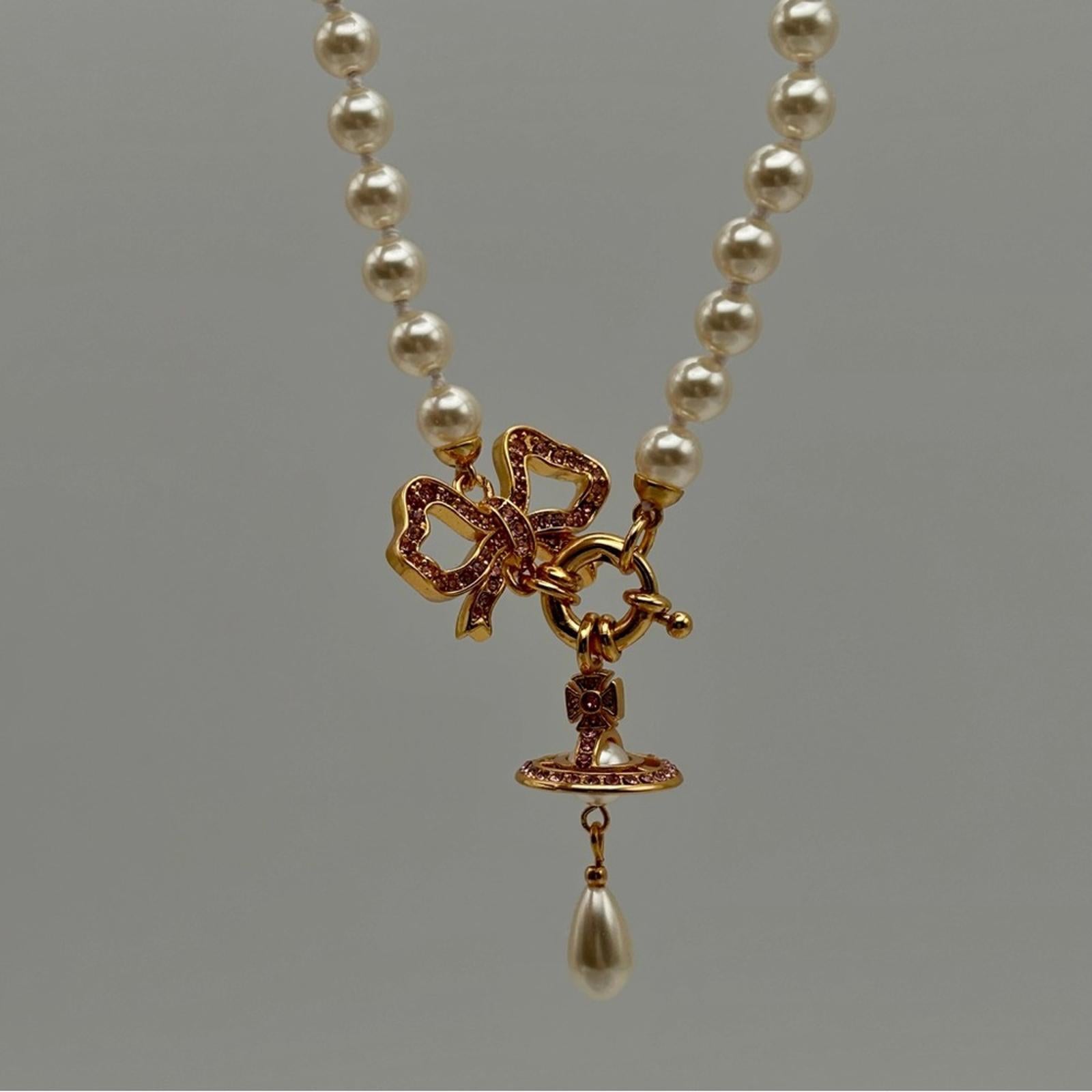 Elegant Pearl Necklace with Gold Accents