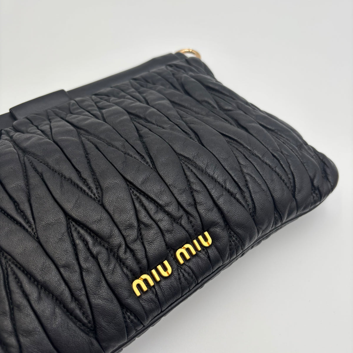 Miu Miu Matelassé Black Leather Clutch with Gold Chain 2000s