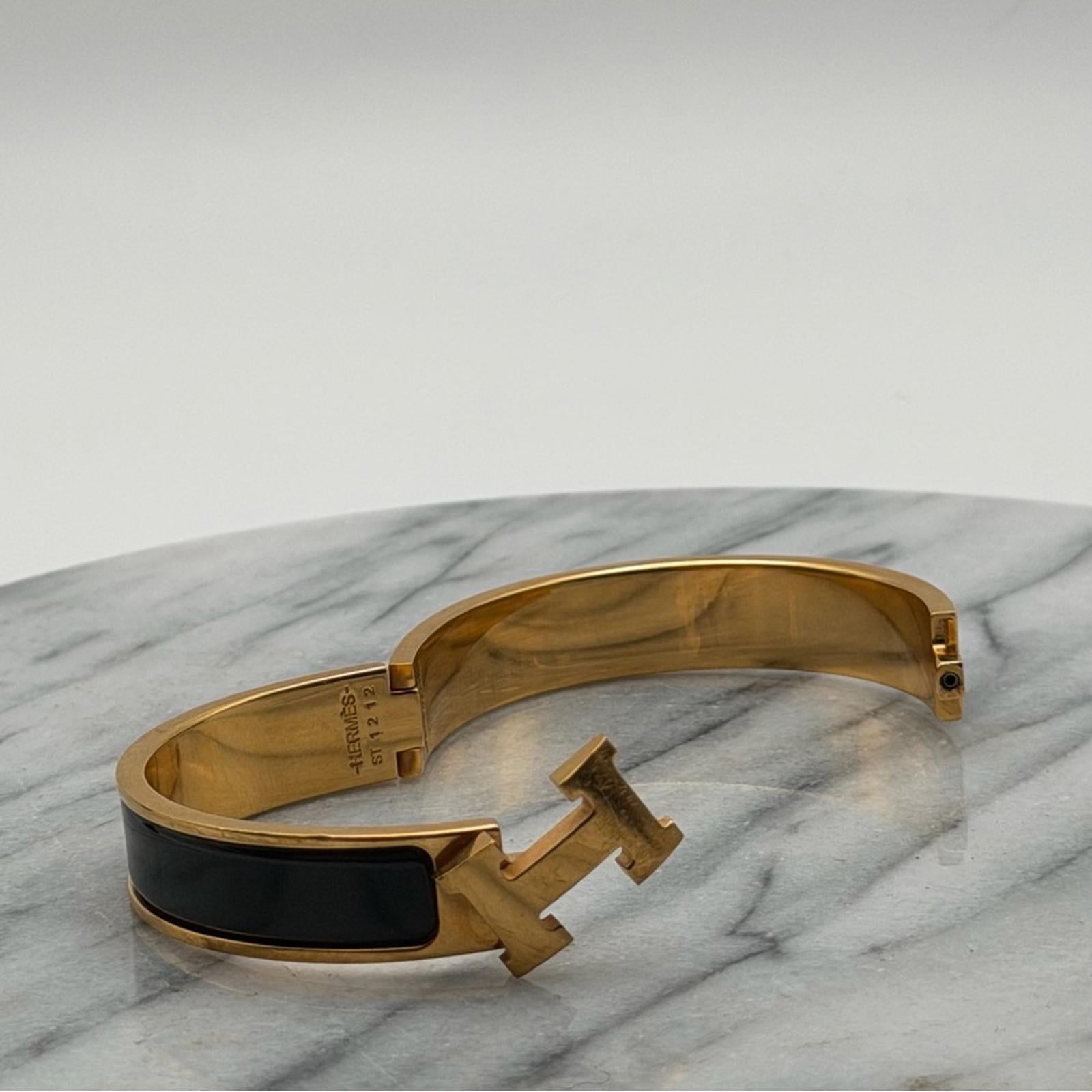 HERMÈS NARROW CLIC H BRACELET – NOIR / GOLD PLATED – GM