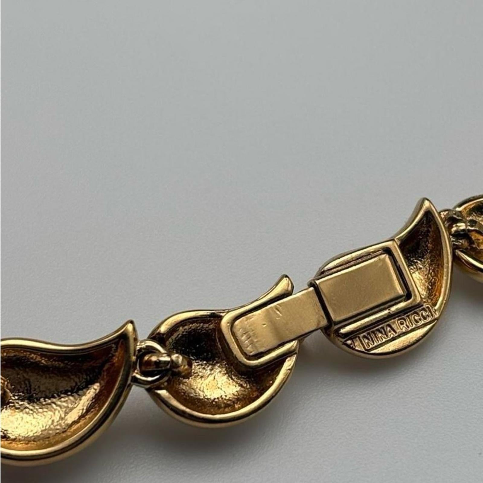 Nina Ricci
Vintage 1980's Gold
Tone Necklace & Earrings - Signed