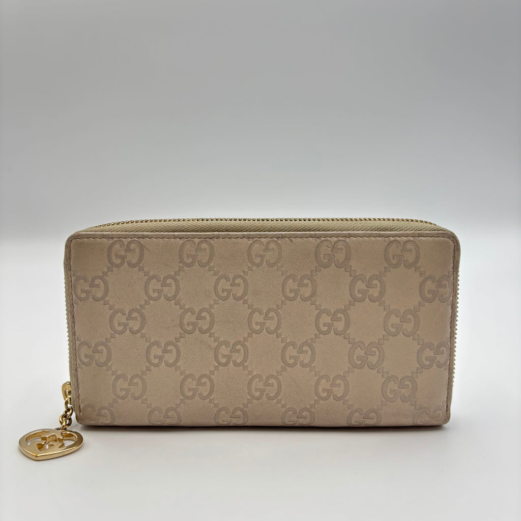 Gucci Guccissima Beige Leather Zip Around Wallet with Gold GG Heart Charm