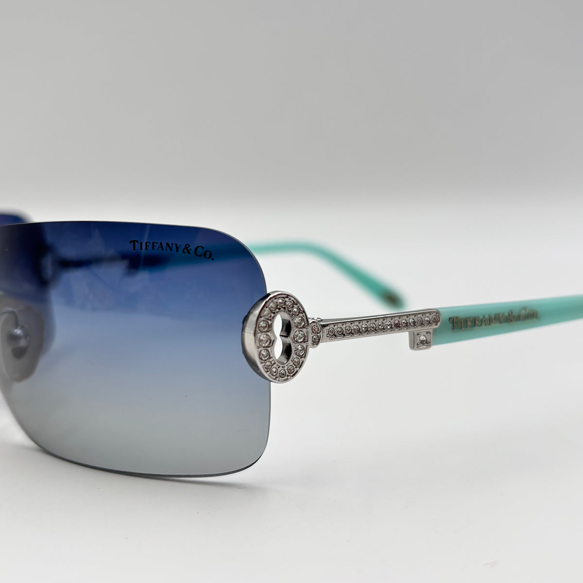 Tiffany & Co. Crystal Key Rimless Blue Gradient Sunglasses