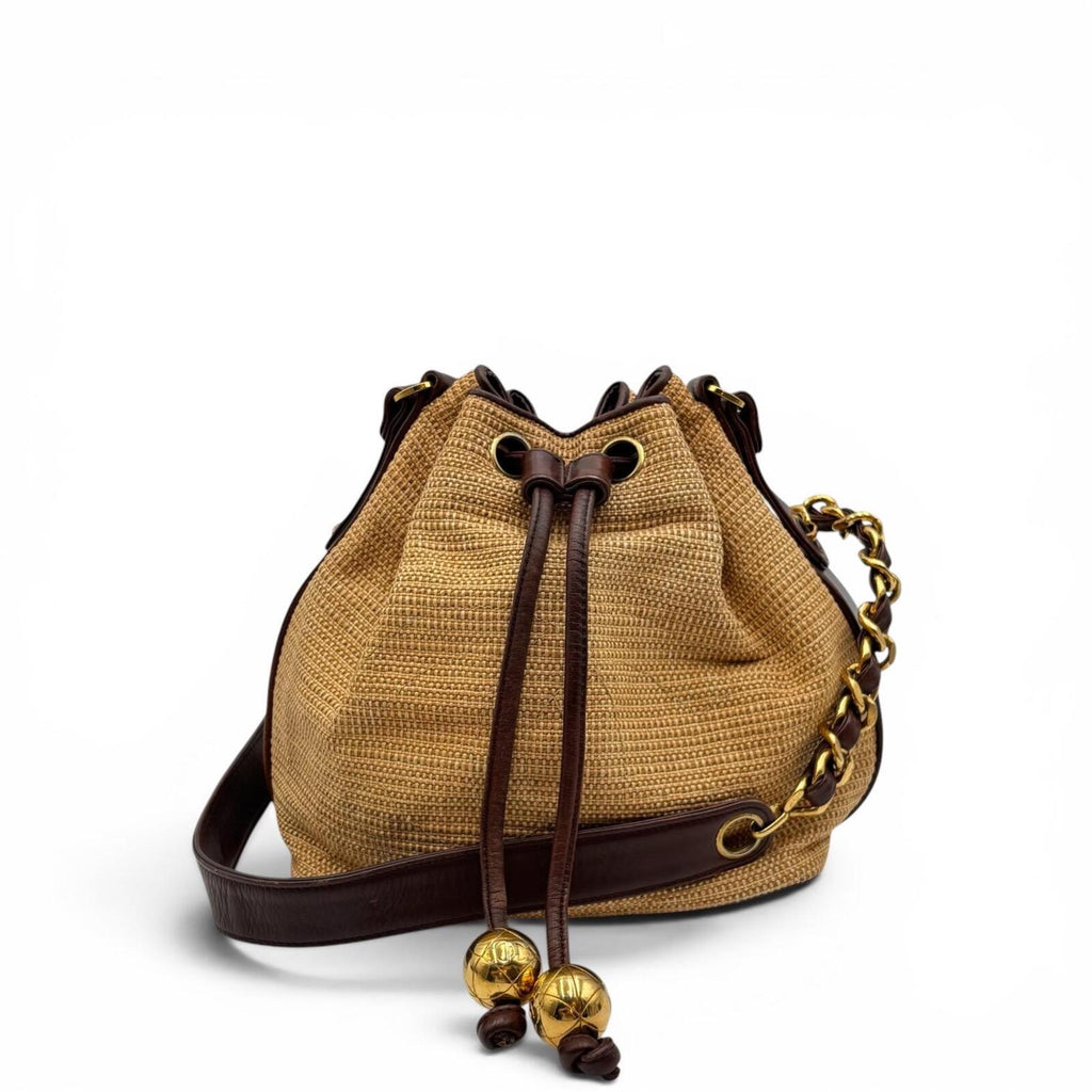 Chanel Raffia Drawstring Bucket Bag With Leather Trim & Gold Hardware