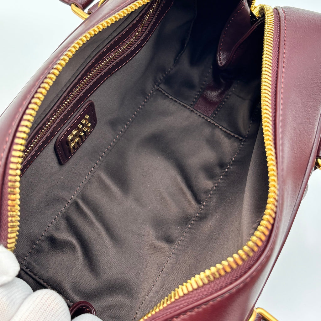 Miu Miu Arcadie Burgundy Matelassé Leather Top Handle Boston Bag With Strap