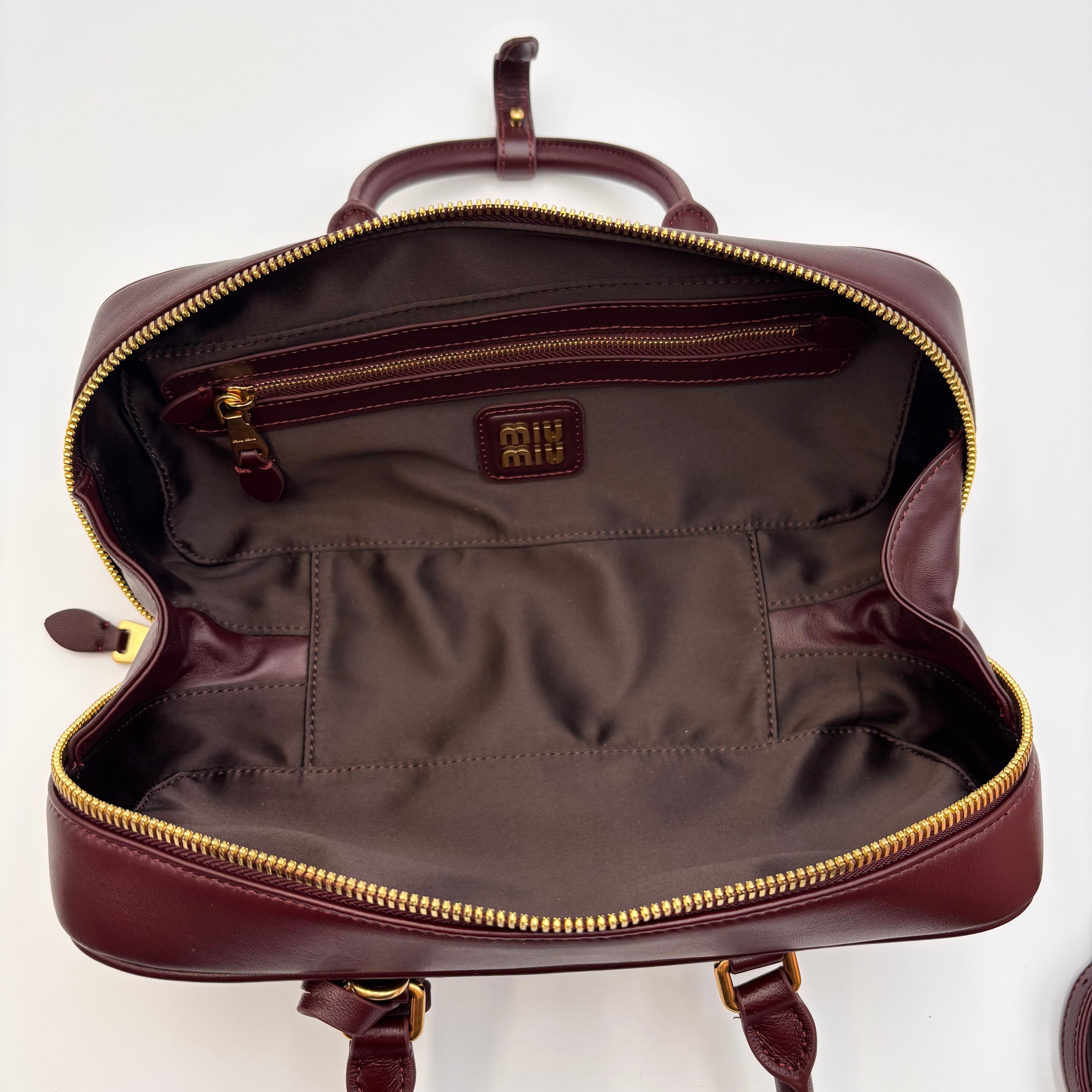 Miu Miu Arcadie Burgundy Matelassé Leather Top Handle Boston Bag With Strap