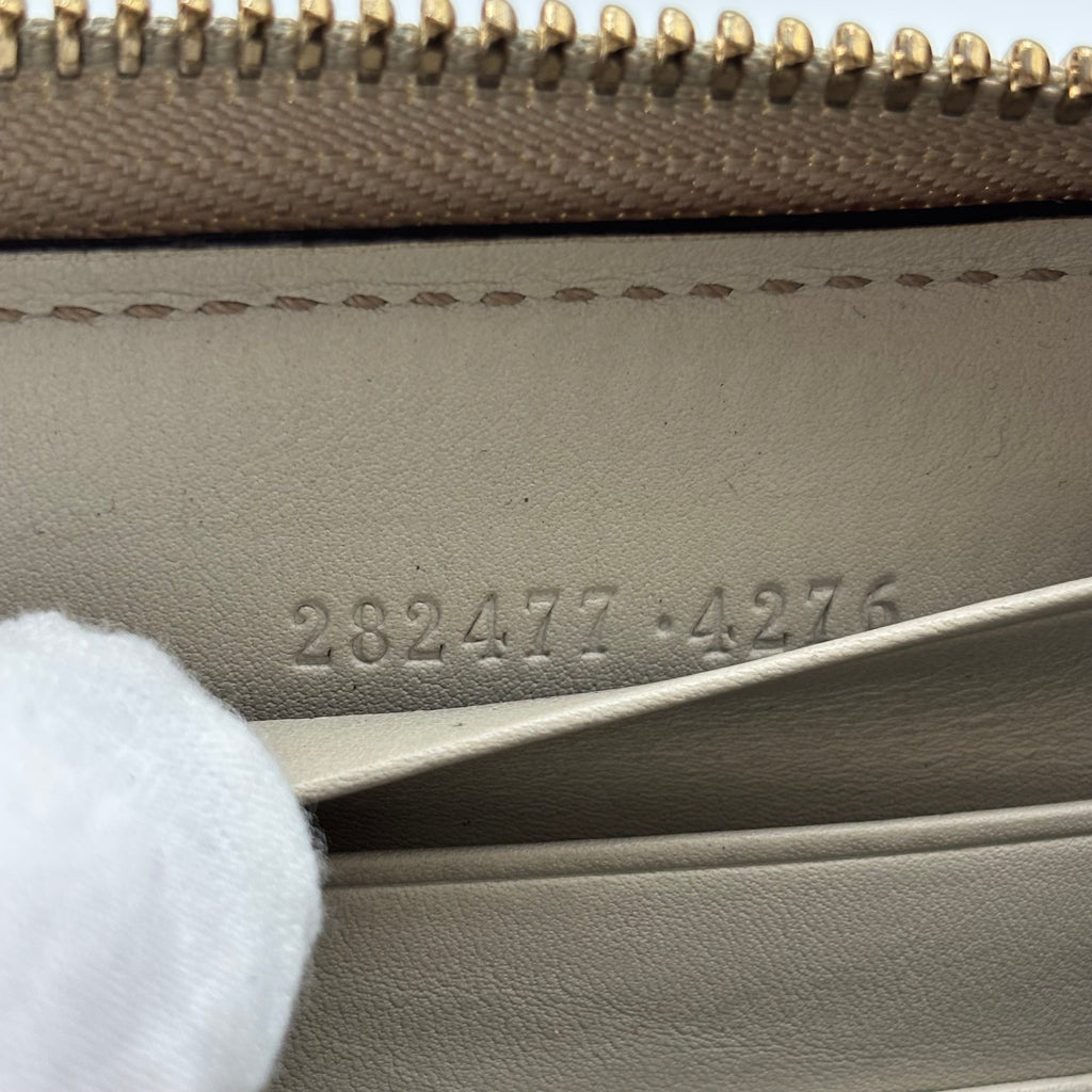 Gucci Guccissima Beige Leather Zip Around Wallet with Gold GG Heart Charm