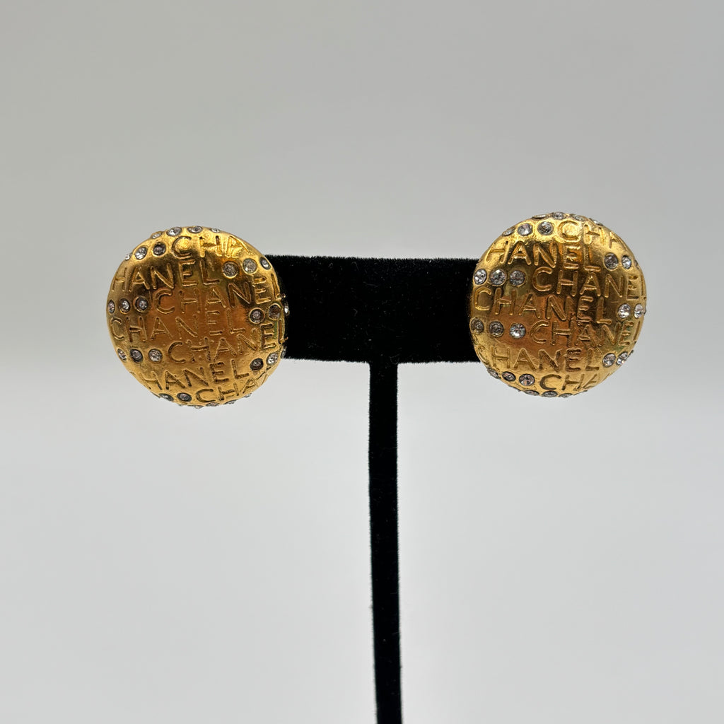 Chanel Gold-Tone Logo Mania Rhinestone Round Clip-On Earrings