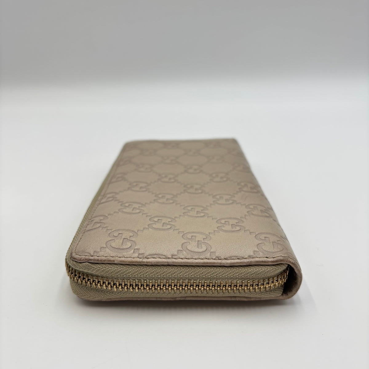 Gucci Guccissima Beige Leather Zip Around Wallet with Gold GG Heart Charm