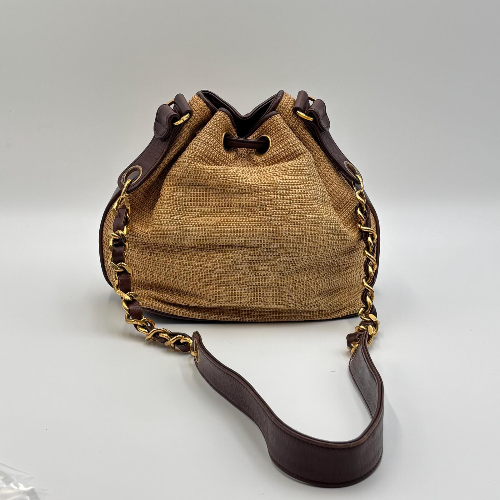 Chanel Raffia Drawstring Bucket Bag With Leather Trim & Gold Hardware