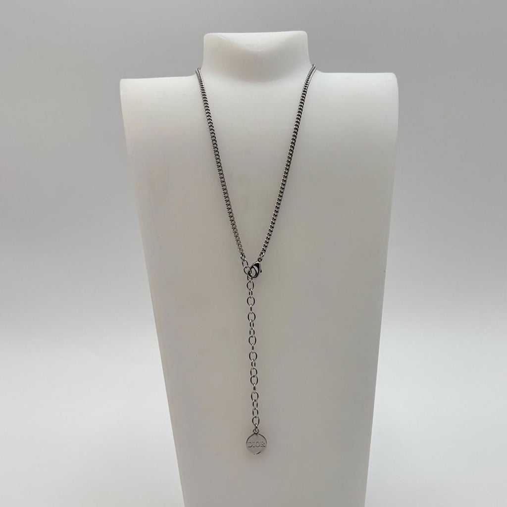 Christian Dior CD Bow Pendant Necklace Silver Tone Crystal Logo