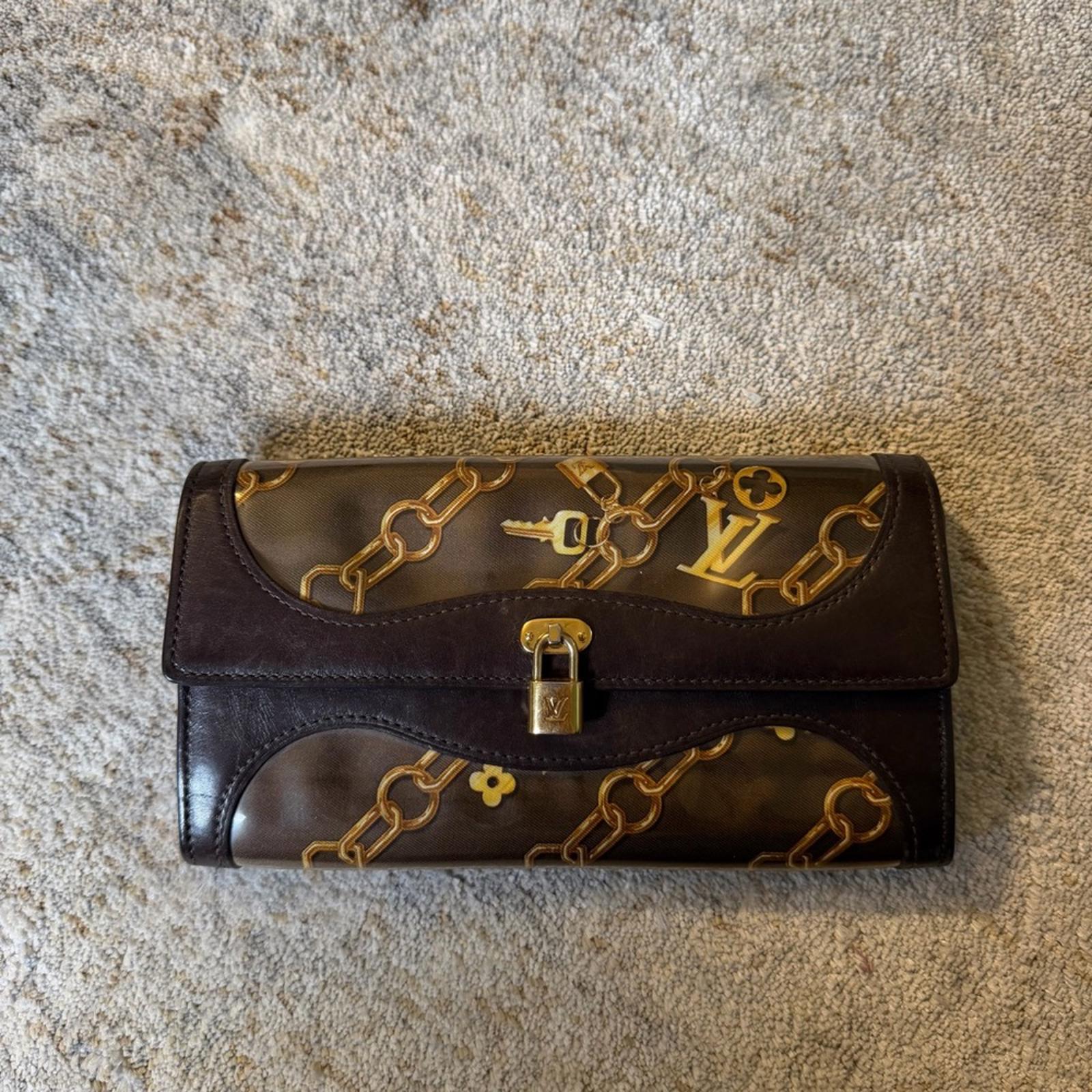 LOUIS VUITTON MONOGRAM CHARMS CHAIN WALLET