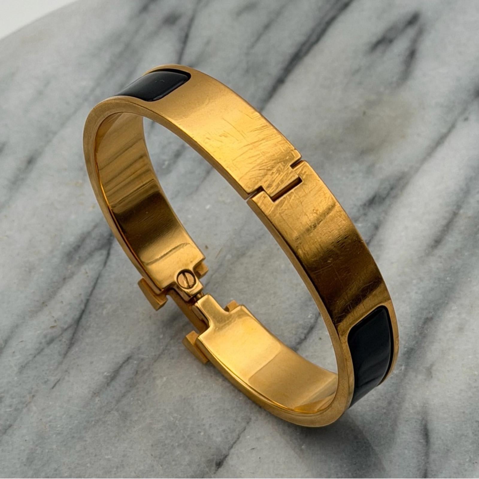 HERMÈS NARROW CLIC H BRACELET – NOIR / GOLD PLATED – GM