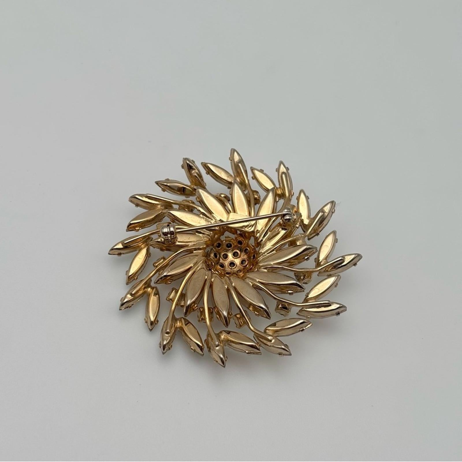 Sherman Aurora Borealis Rhinestone Floral Brooch – Gold Tone