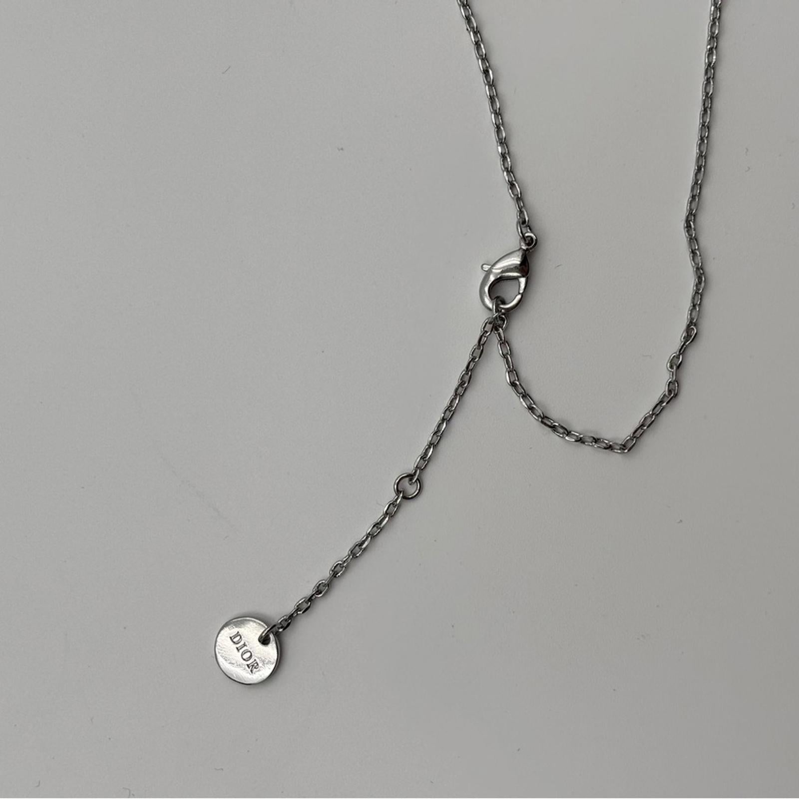 Christian Dior Silver Ribbon Pearl Pendant Necklace