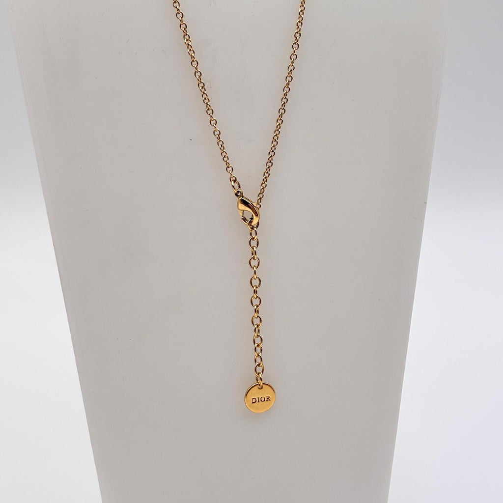 Christian Dior Gold Tone CD Bow Pendant Necklace
