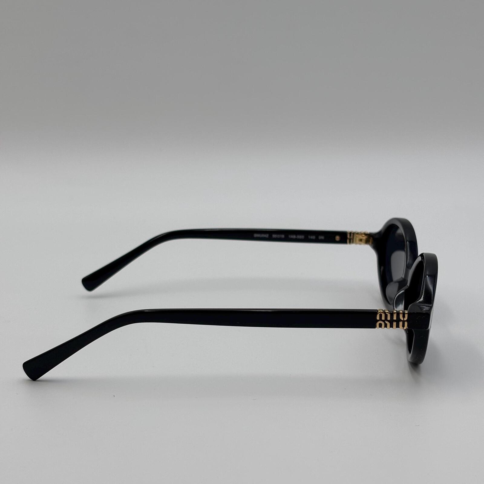 Miu Miu SMU04Z Black Oval Sunglasses