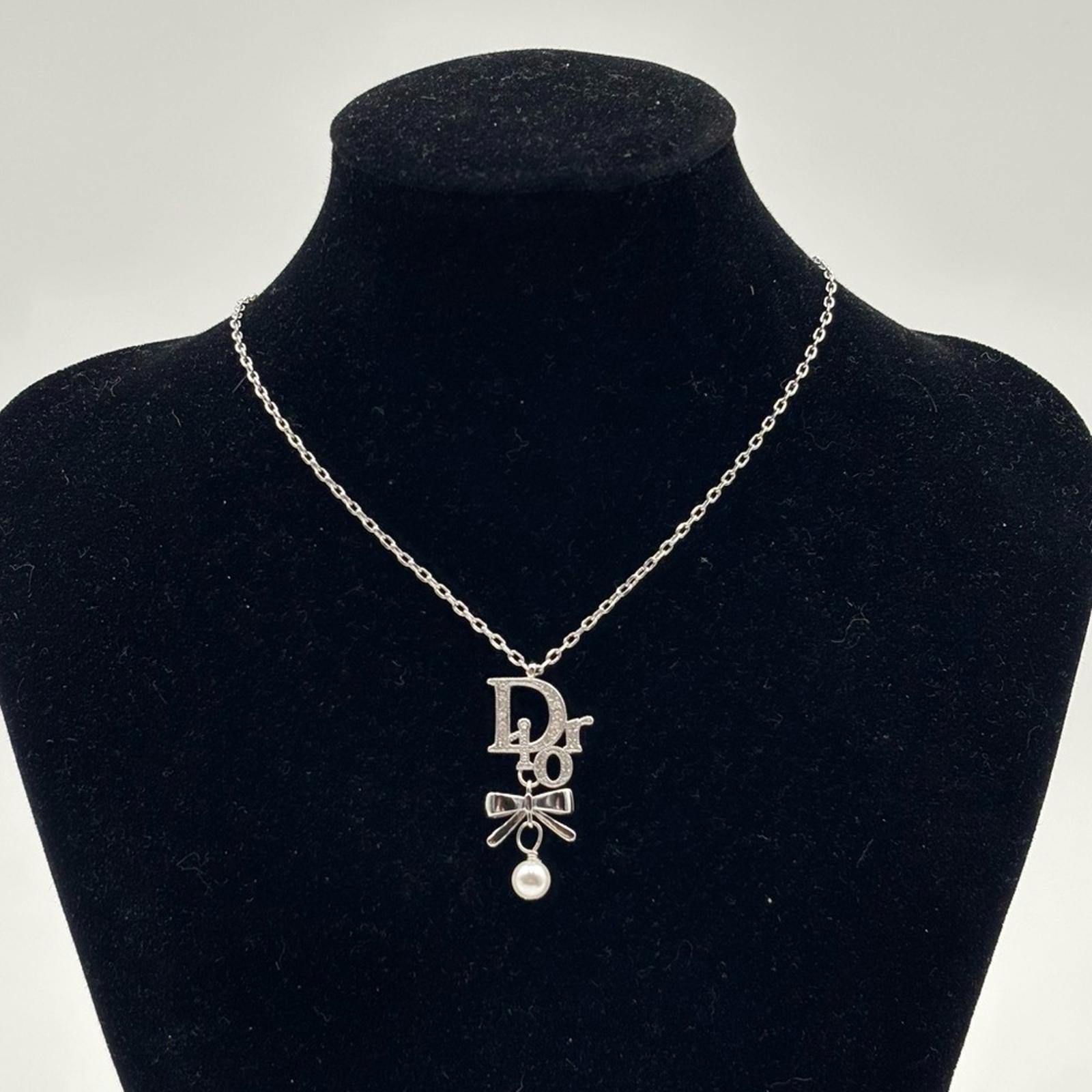 Christian Dior Silver Ribbon Pearl Pendant Necklace