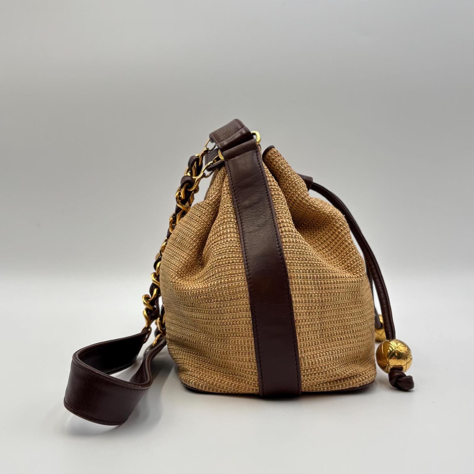 Chanel Raffia Drawstring Bucket Bag With Leather Trim & Gold Hardware
