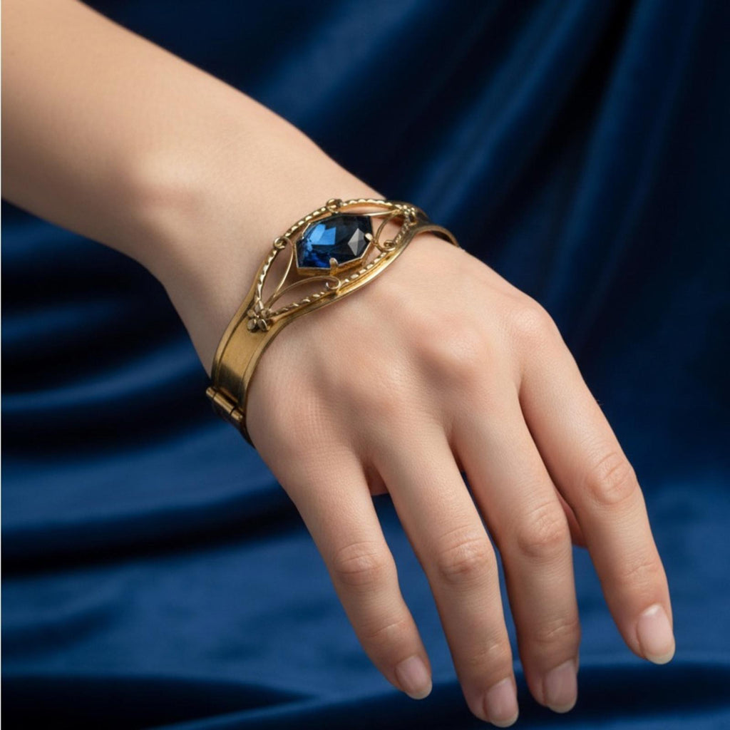 Vintage Gold Tone Statement Bangle – Faceted Blue Stone