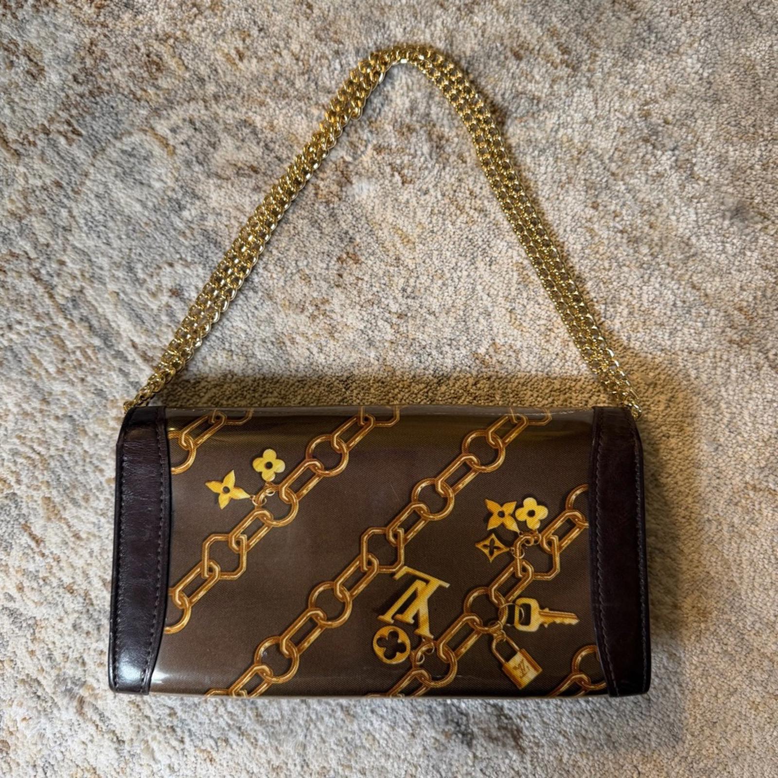 LOUIS VUITTON MONOGRAM CHARMS CHAIN WALLET