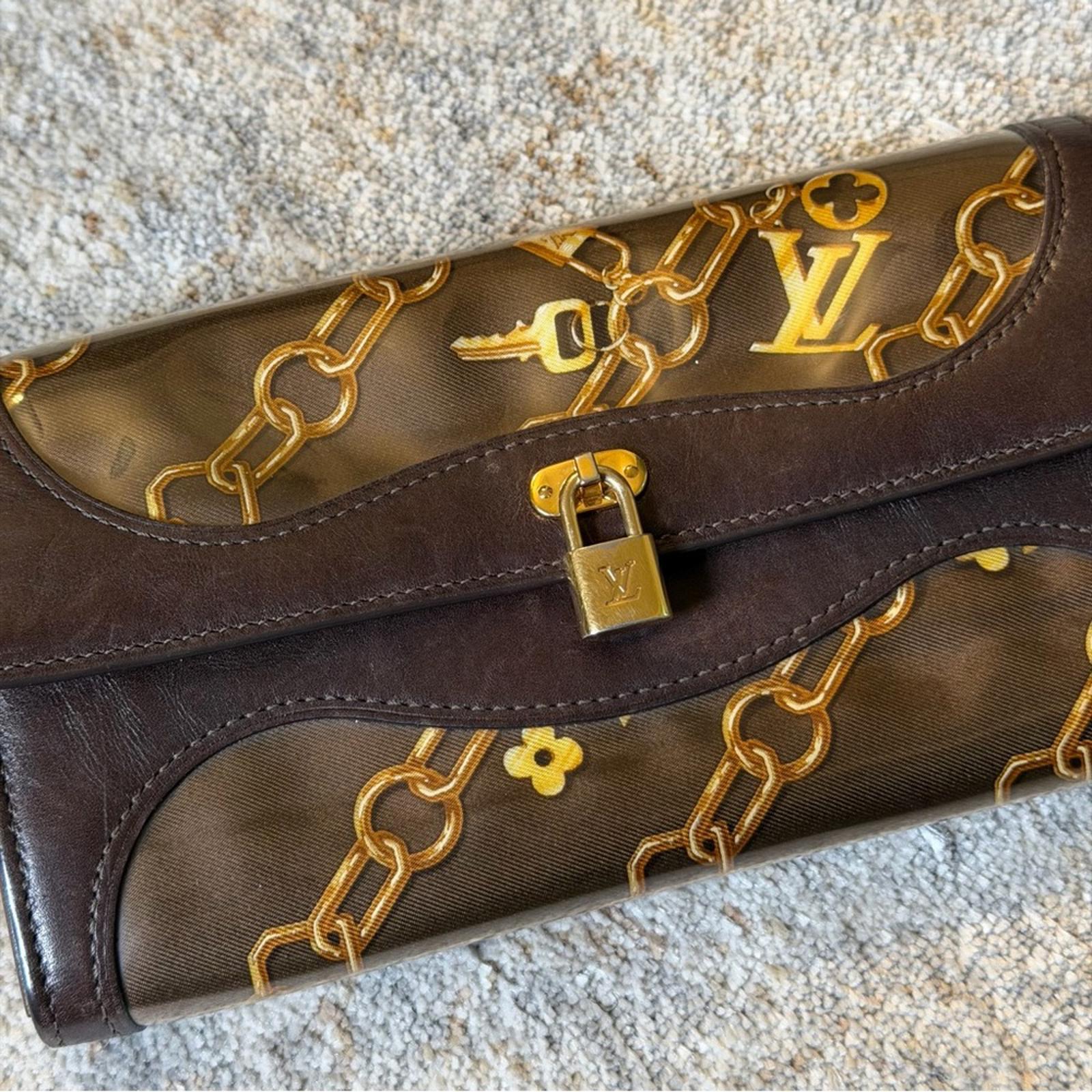 LOUIS VUITTON MONOGRAM CHARMS CHAIN WALLET
